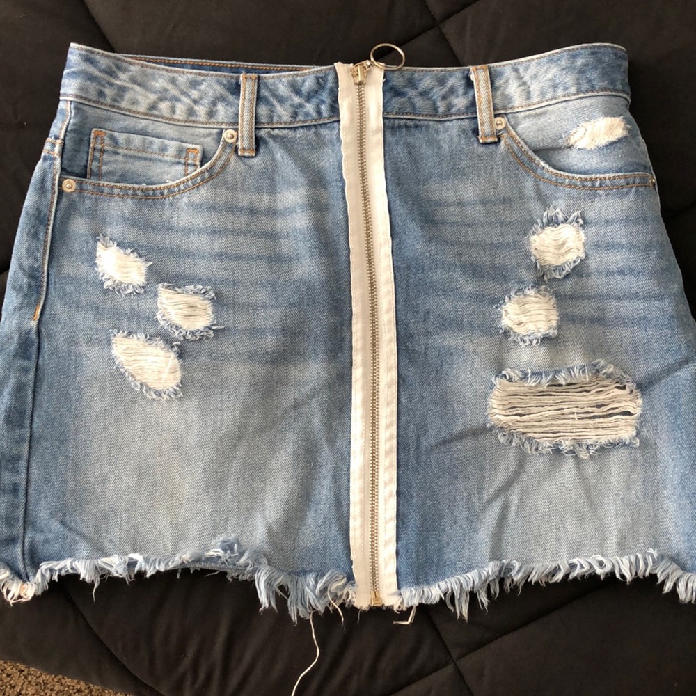 Forever 21 Distressed denim zip up skirt.